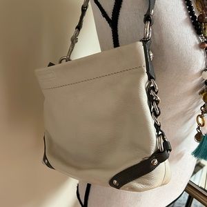 Coach handbag. Medium size. Like new condition.  Ivory with green silk interior.